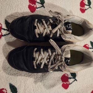 Under Armour Black Sneakers with Patterned White Laces